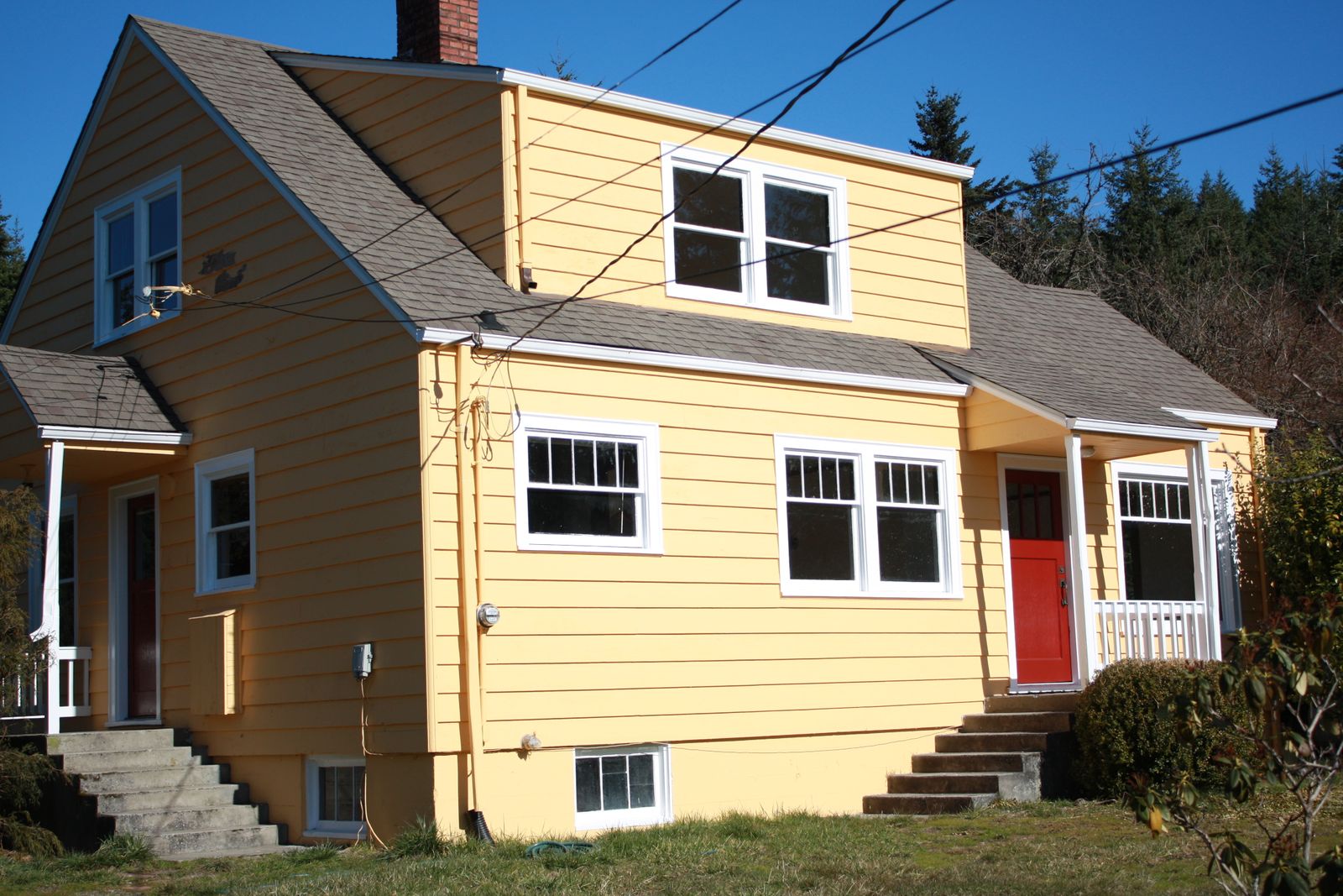 Yellow two-story home exterior